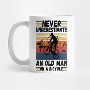 never underestimate an old man on a bicycle Mug